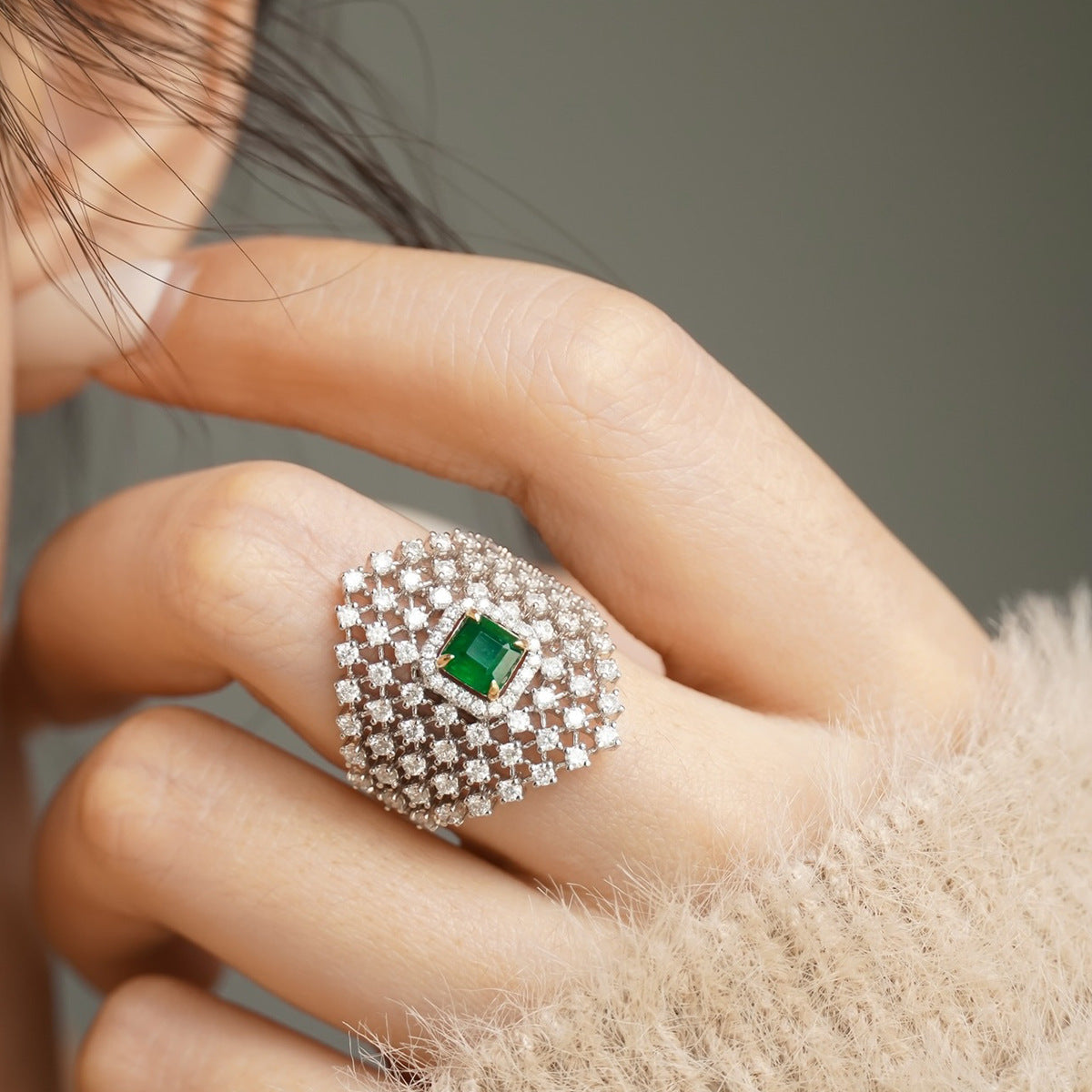 Close-up of a hand wearing a personalized French-inspired ring with diamond inlay in S925 sterling silver.