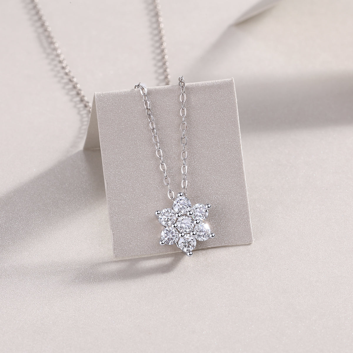 Snowflake Fluttering moissanite pendant necklace set crafted in S925 silver with platinum plating for a luxurious finish